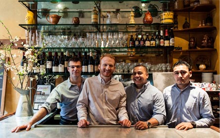 A Welcoming photograph of the staff at Le Gigot.